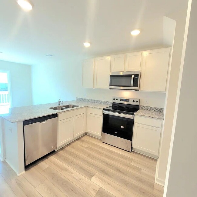 Building Photo - Available soon in new Canopy of Oaks at Hunters Crossing!