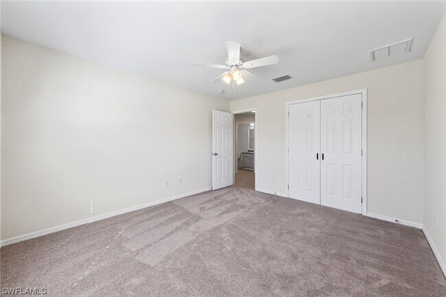 Building Photo - 4BR Home in Gated Town Lakes Community with Lake View