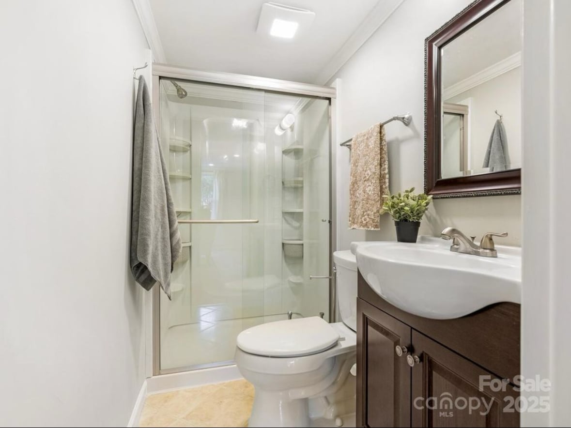 Full bath downstairs - 9324 Rainbow Forest Dr