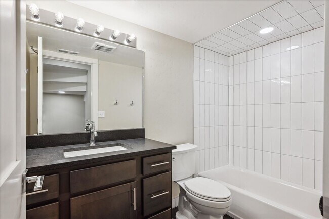 Building Photo - Modern 4-Bedroom Townhome with Rooftop Deck Near Sloan’s Lake & Light Rail