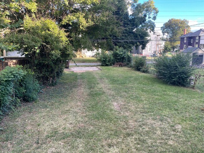 Building Photo - Large house on the North Side of town! Central HVAC, Laundry, Large yard, all appliances.