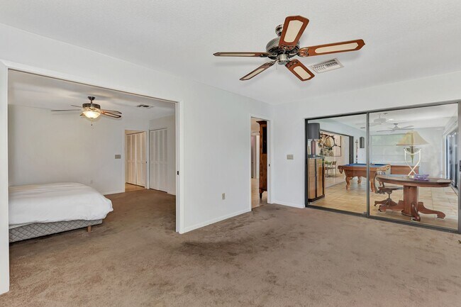 Building Photo - BEAUTIFUL 2 BEDROOM 2 BATHROOM + A DEN VILLA WITH GORGEOUS LAKE VIEWS!