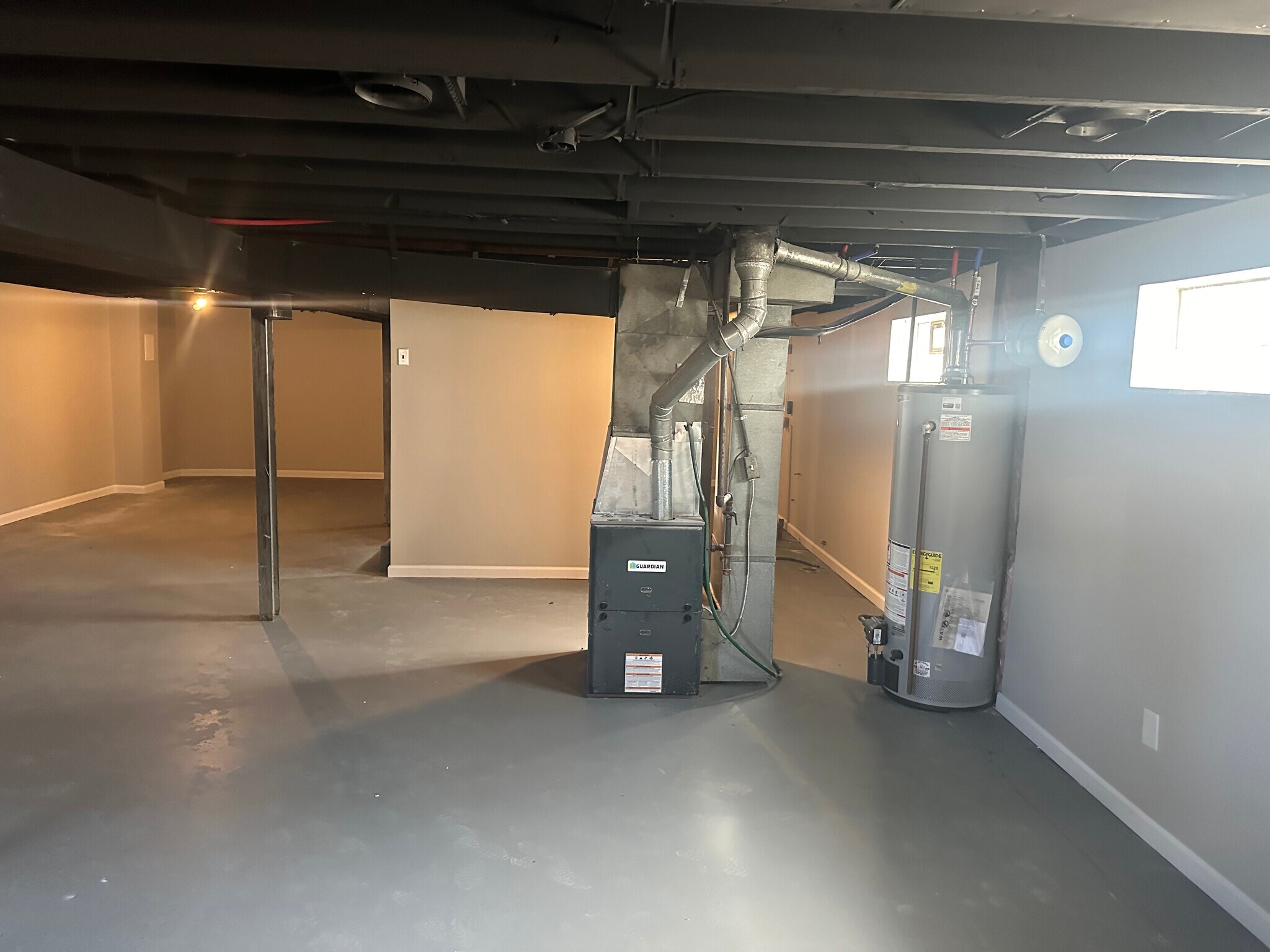 Partially finished basement with washer and dryer hookups - 11376 Manchester Rd