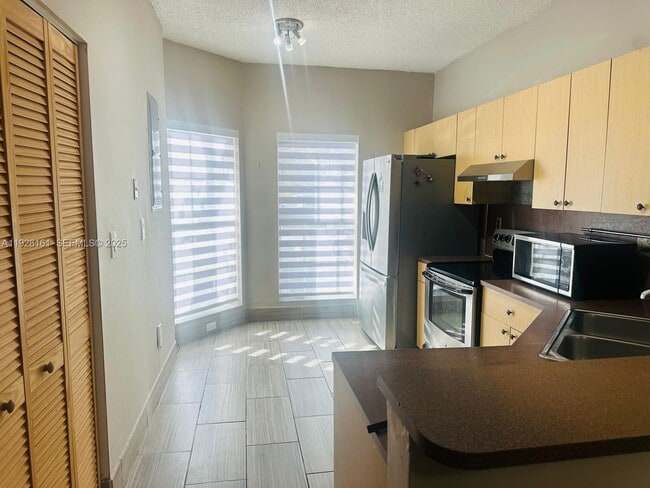 Building Photo - 14345 SW 57th Ln