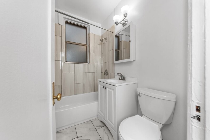 Building Photo - 1361 W Estes Ave