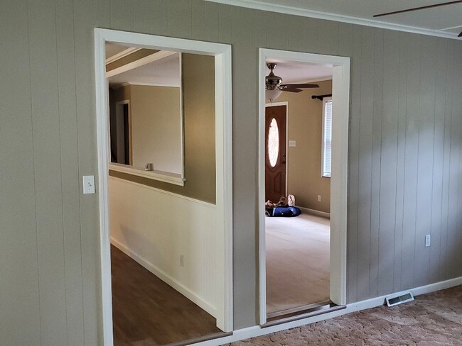 View of Diningroom and Livingroom from Den - 4521 Mellowood Cir