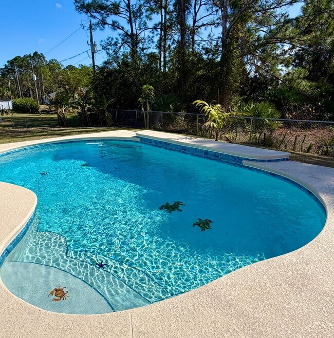 Building Photo - Palm Bay Pool Home Stunner!