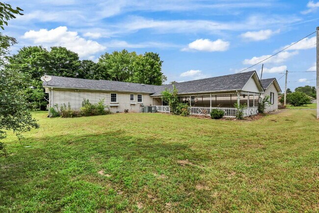 Building Photo - spacious 4-bedroom, 2.5-bath home featuring a 2-car garage and fresh updates throughout.