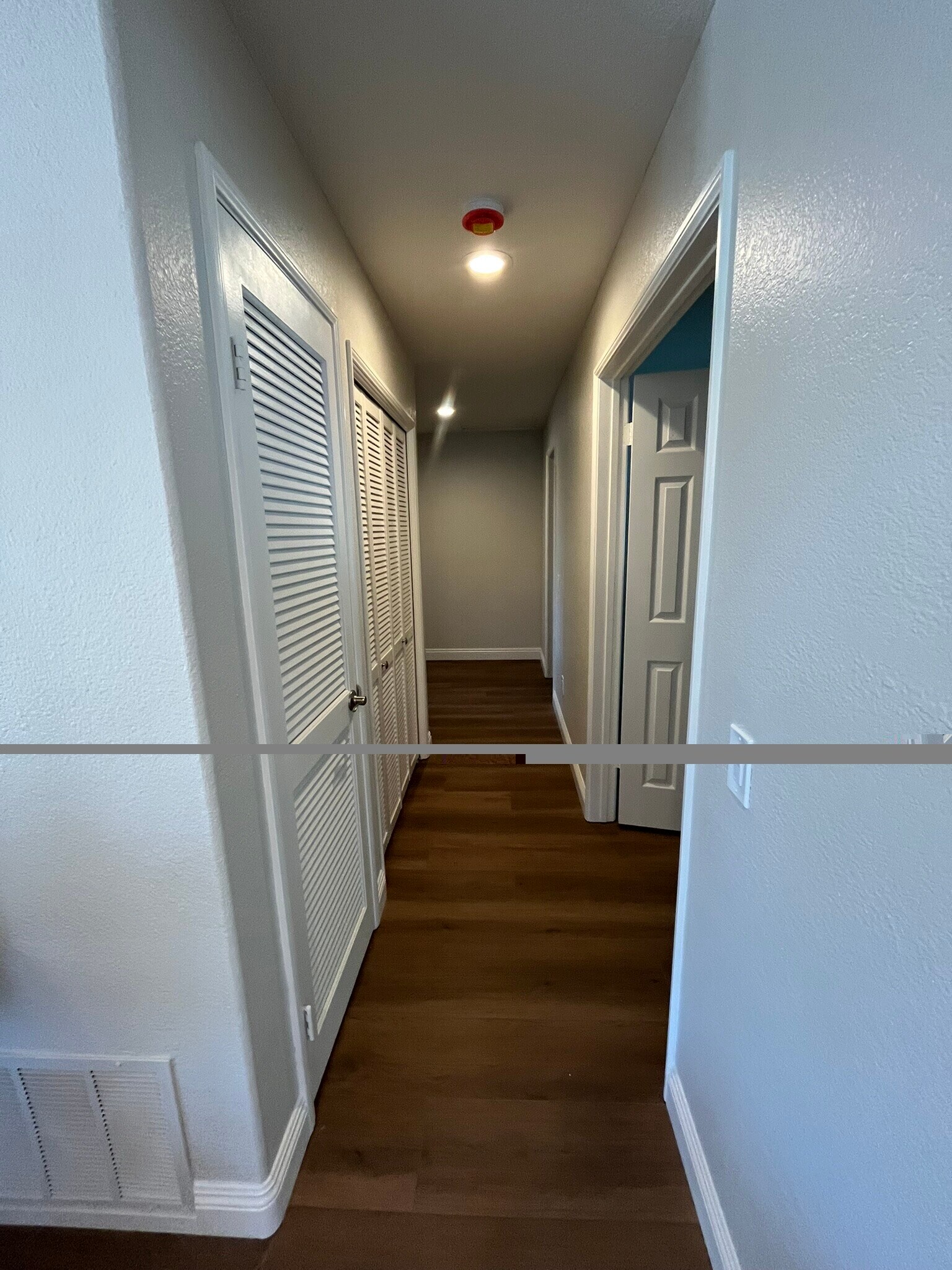 Hallway from living room to bedrooms and baths - 16274 Avenida Venusto