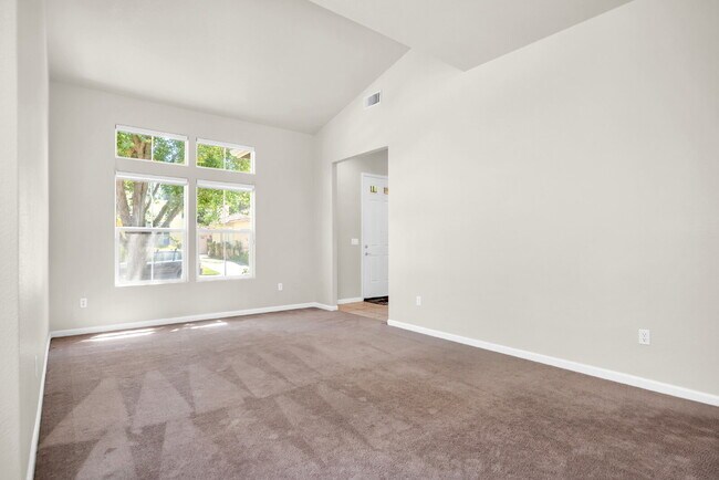 Building Photo - Move-In Ready 4-Bed, 3-Bath Gem in a Covet...