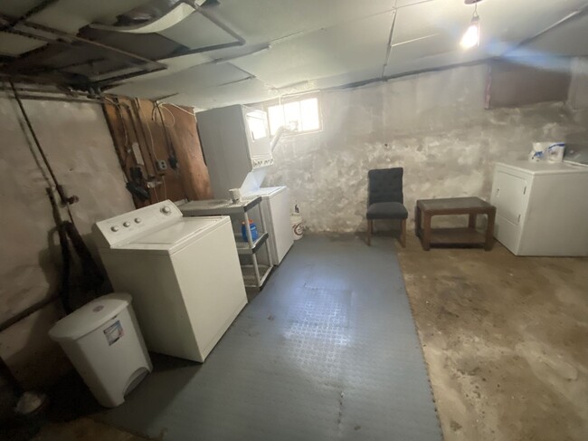 Laundry unit in basement - 21 Royall St