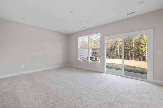 Building Photo - Available 08/15! Spacious Townhome in Prime Andrew Chapel Community