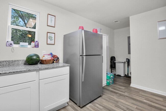 Building Photo - Bright and Airy 3-Bedroom Retreat with Dec...
