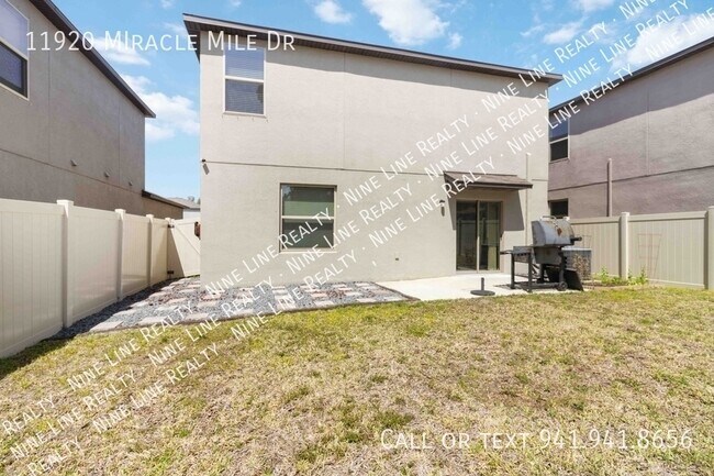 Building Photo - 11920 MIracle Mile Dr-