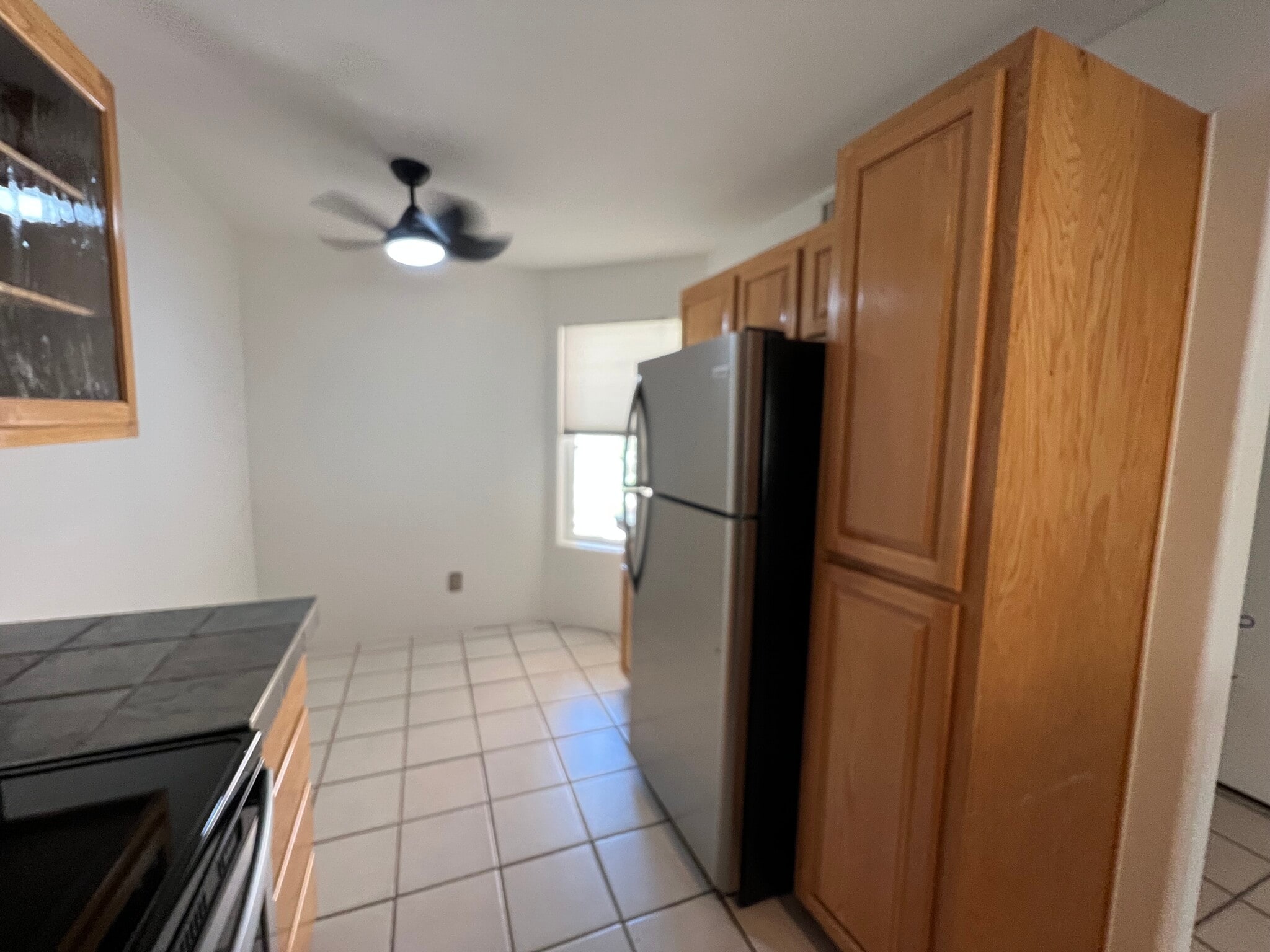 Kitchen w/ stainless steel appliances - 5675 N Camino Esplendora