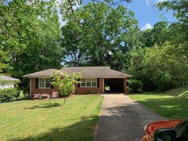 Building Photo - Fully Furnished and Move-in Ready: Charming 2BR/1BA Home