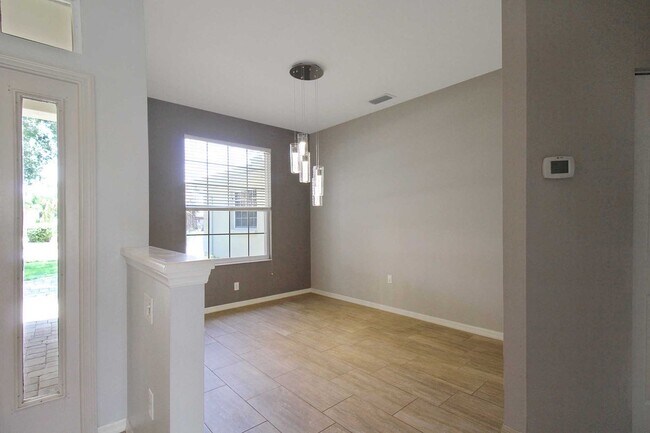 Building Photo - Annual rental: Spacious 3BR/2BA Creekwood Home with Office, Screened Lanai, EV Charger & Resort-S...