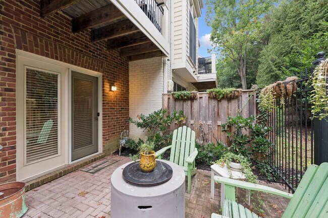 Building Photo - Discover this stunning four-level townhous...