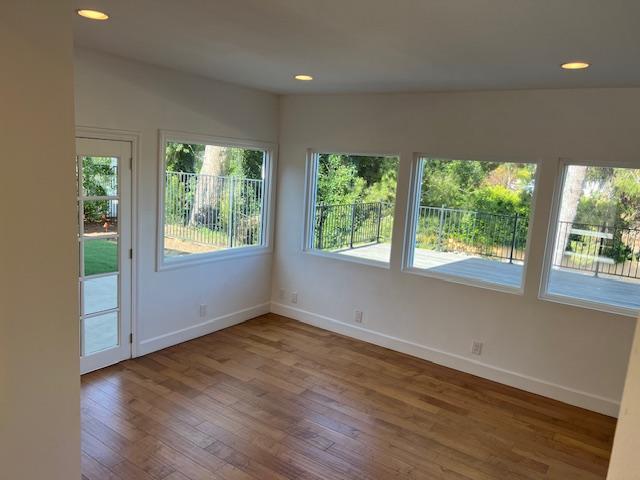 Den/TV room with double doors to backyard - 2812 Anchor Ave