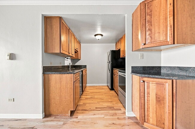 Building Photo - $1,670.95 with $300 Off the first month's rent - 2 Beds, 1.5 Bath, Condo in Denver with Balcony!