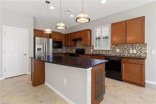 Building Photo - 6068 Triumph Ln