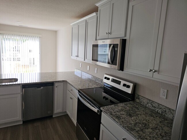 Building Photo - Brand New 3BR Home Minutes from the Airport