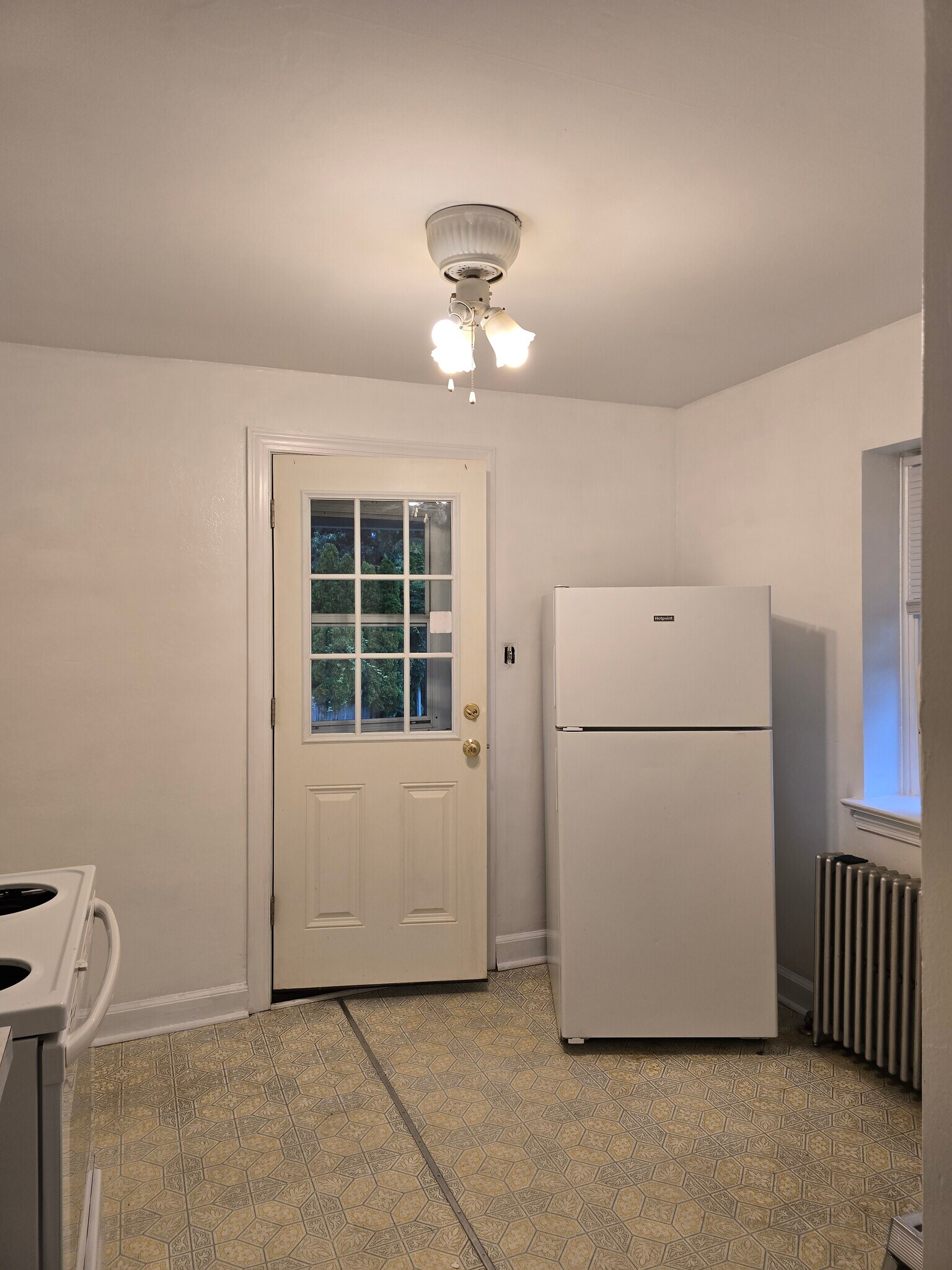 kitchen; outside entrance via exterior stairway - 160 Morton Ave