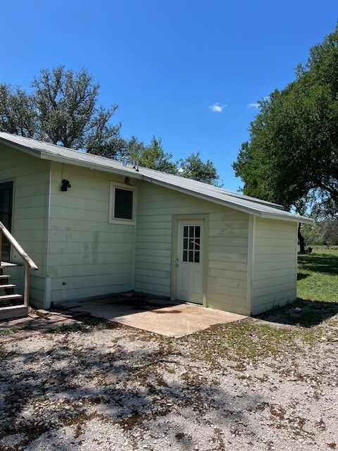 Utility room with washer/dryer hook ups - 9900 E State Highway 71