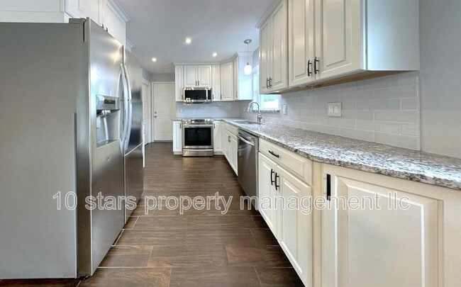 Building Photo - 6849 99th Ave