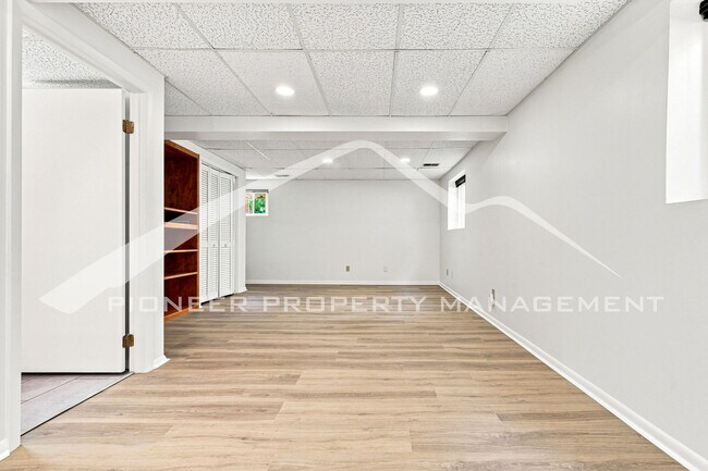 Building Photo - Spacious Home with Central AC and Traditional Wood Features