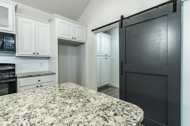 Building Photo - The Finer Things In Life/ The Town Homes o...