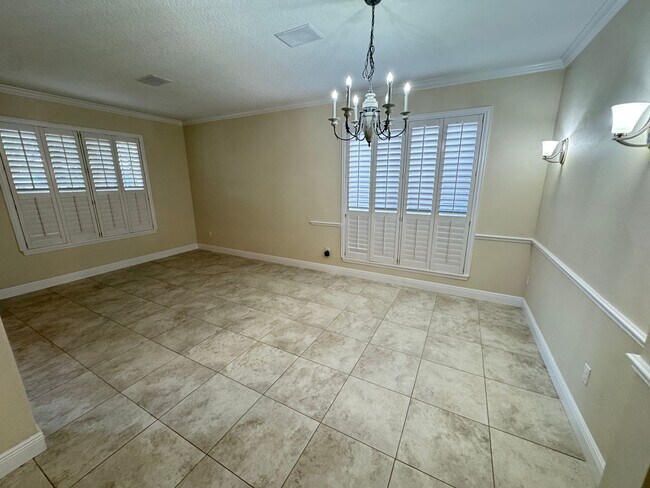 Building Photo - Spacious 4-Bedroom Home with Private Pool and Modern Comforts