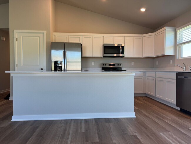 Building Photo - Spacious 4-Bedroom Split-Level Near Standing Bear Lake & Trails