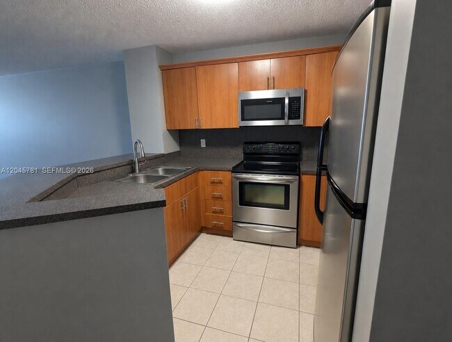 Building Photo - 8750 N Sherman Cir