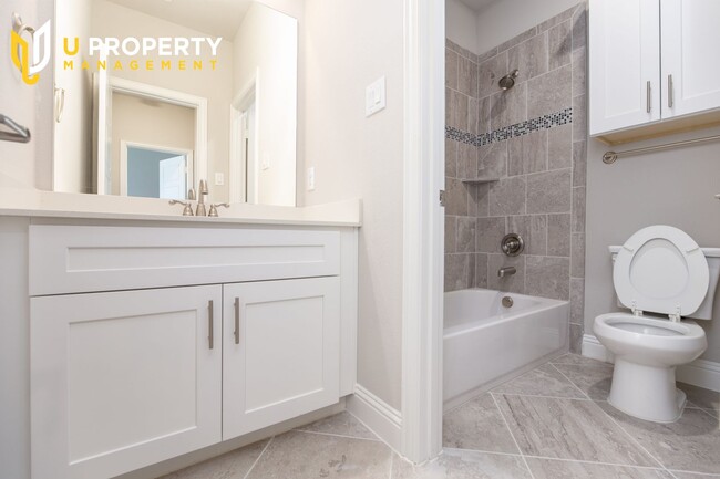 Building Photo - Luxury Townhome- wood flooring. Great location