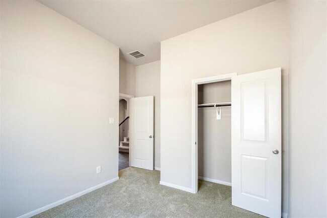 Building Photo - AVAILABLE NOW! This  3 bedroom, 2.5 bath, 1.5 story home is located in the convenient location of...