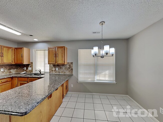 Building Photo - 5000 Poplar Glen Dr