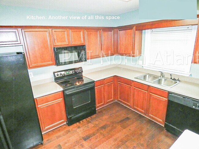 Building Photo - Now Available – Stunning 2-Bedroom Townhom...