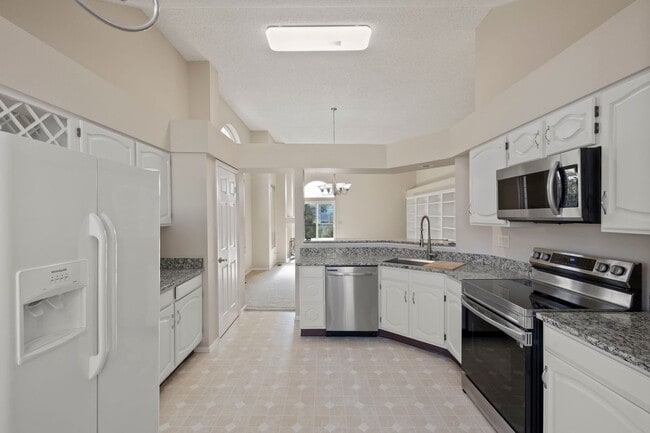 Building Photo - BRIGHT & UPDATED RANCH-STYLE HOME in D-20