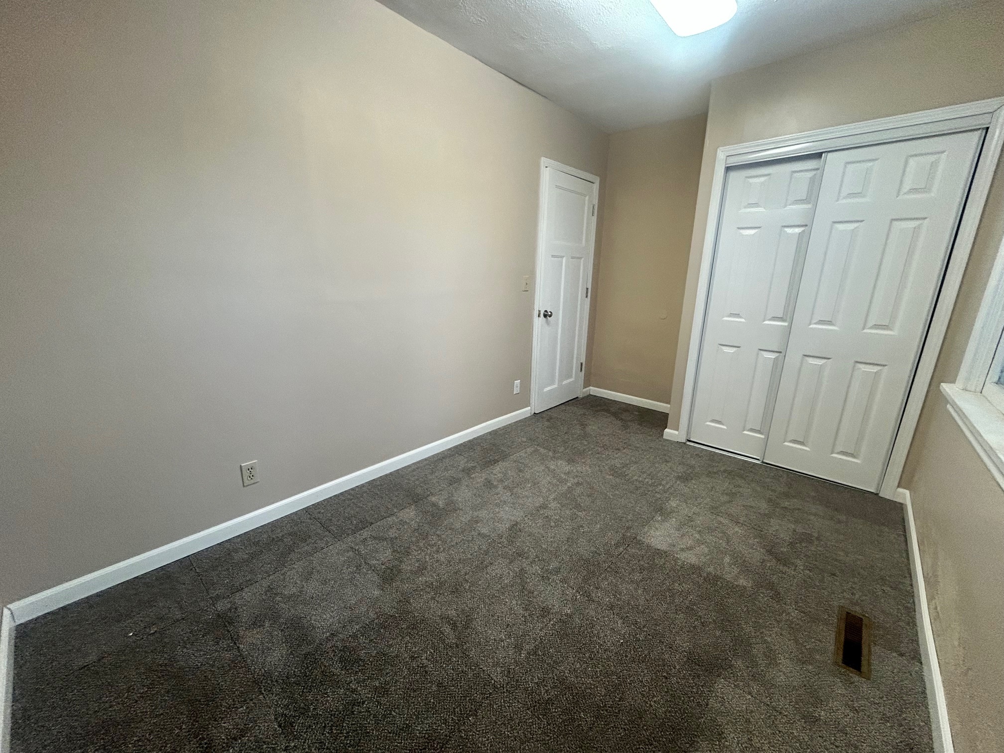 Bedroom 2 with BRAND NEW carpet - 213 Lake Ave W