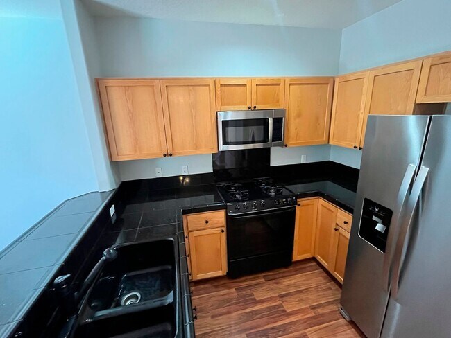 Building Photo - Elegant Arbor Townhome with Open Kitchen, W/D, Patio, and Soaking Tub