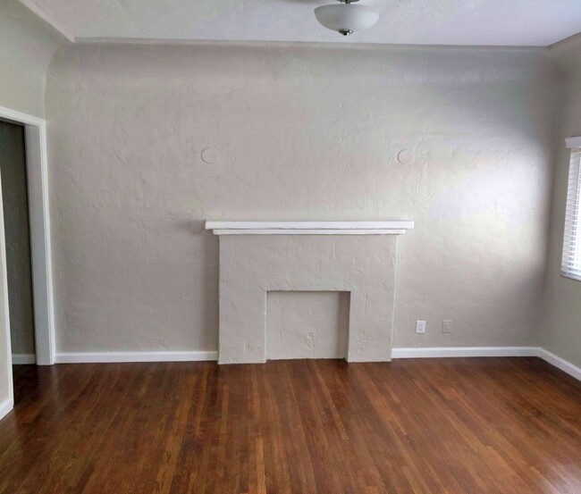 Faux Mantle Fireplace in Living Room - 1828 S Curson Ave