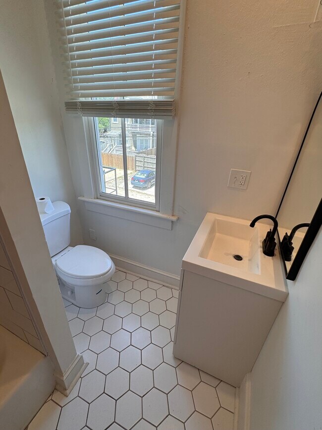 Toilet and Vanity - 2115 Lincoln St