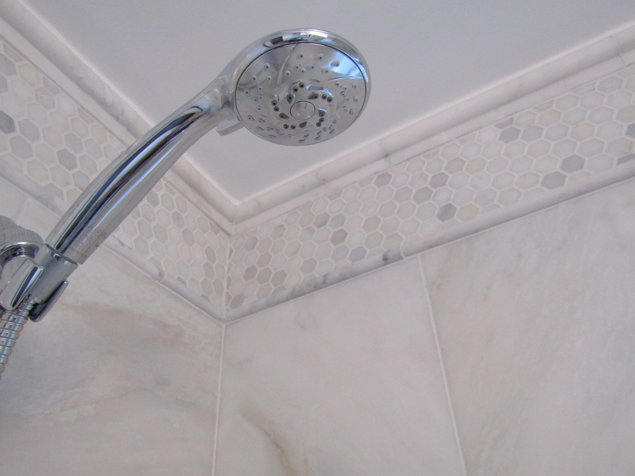 Marble tile extends all the way to the ceiling - 1800 West Abingdon Drive