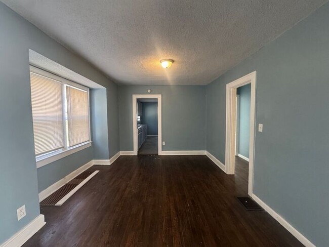 Building Photo - Charming 3BR 2BA Home w/ Fenced Yard + Covered Porch in KC