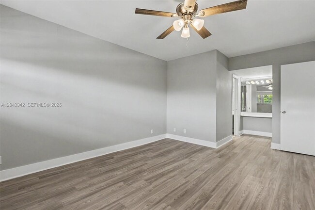 Building Photo - 3250 N Palm Aire Dr
