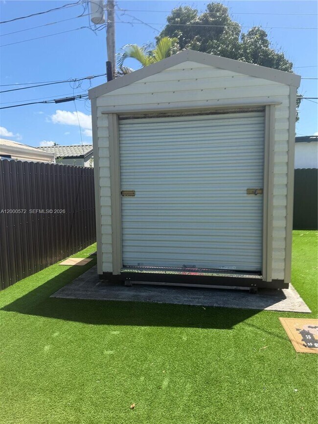 Building Photo - 6497 W 8th Ln