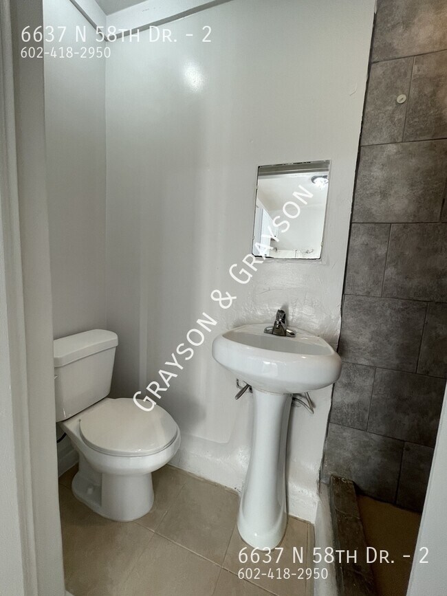 Building Photo - 6637 N 58th Dr
