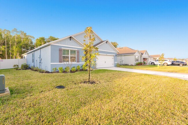 Building Photo - Never Lived in 4 Bed, 2 Bath Ormond Home with Upgrades and a Fenced Yard