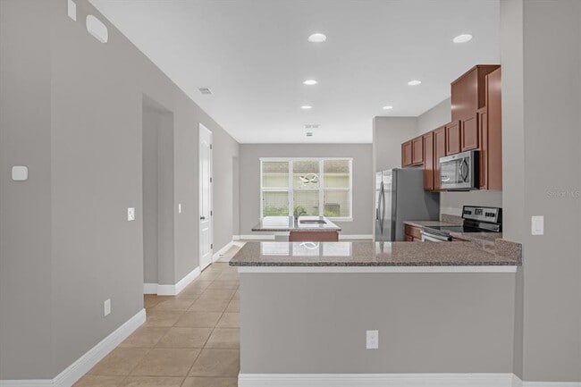 Building Photo - 15537 Honeybell Dr